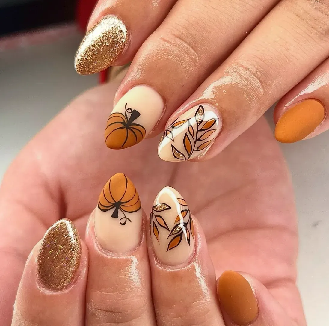 Pumpkins meet golden shimmer and matte orange tones in this autumn-perfect look. It’s glam, cozy, and just right for the holiday season.