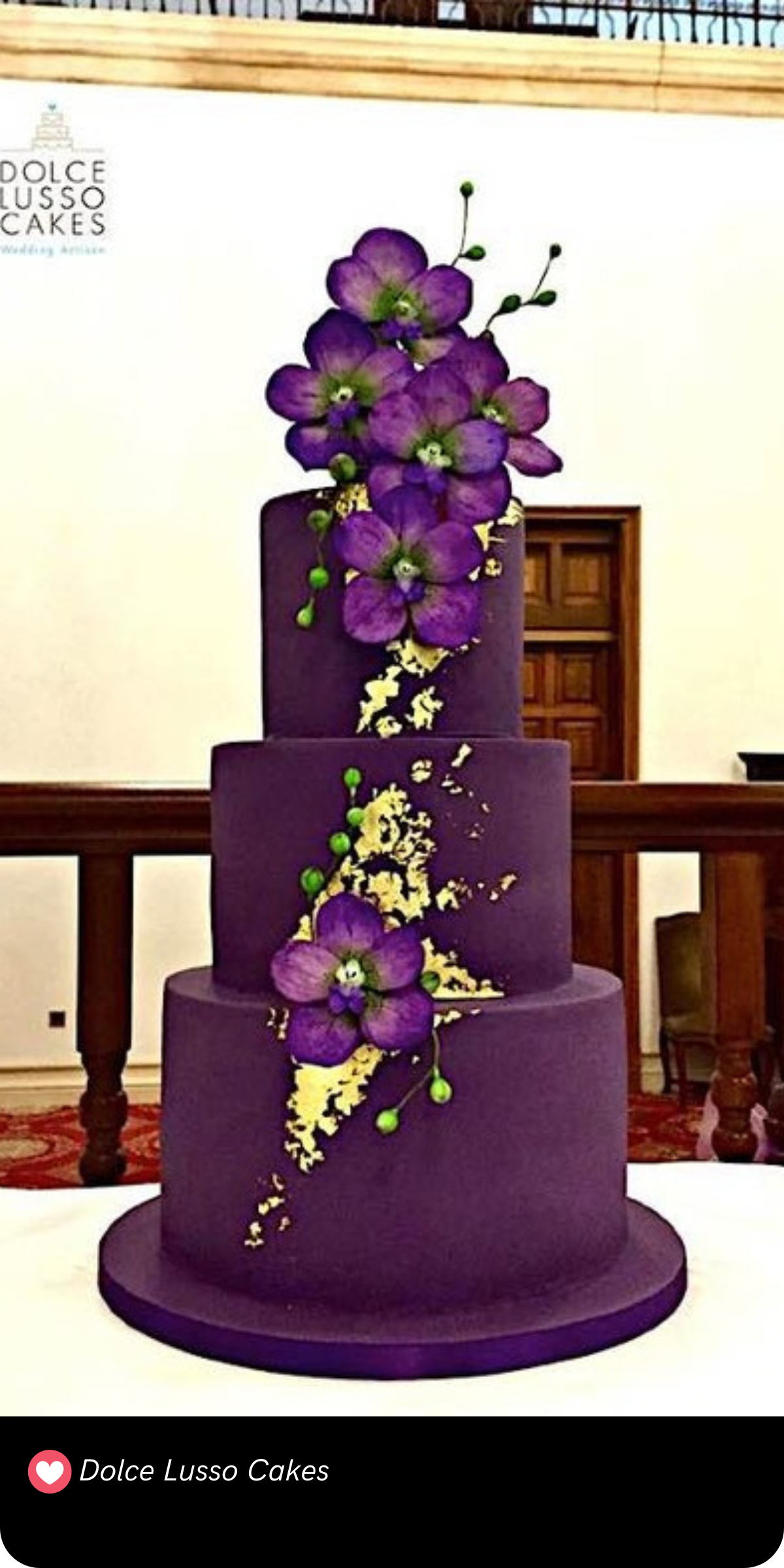 This regal, gold-embellished cake is fit for royalty, with delicate violet blooms cascading down like a shower of petals. The luxurious gold detailing adds an elegant, vintage charm.