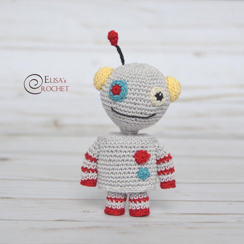 Crochet this sweet little robot as a party favor or a play mate for your child