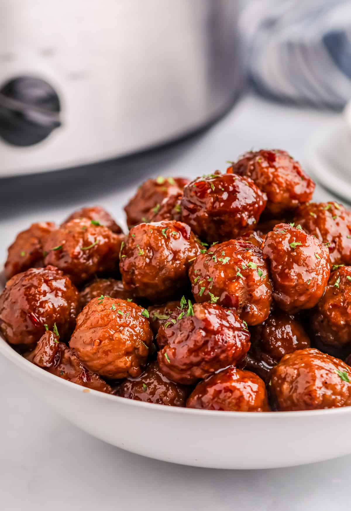 Meatballs coated in a sweet and tangy sauce that’s great for dinner or even as a party appetizer. They’re irresistible.