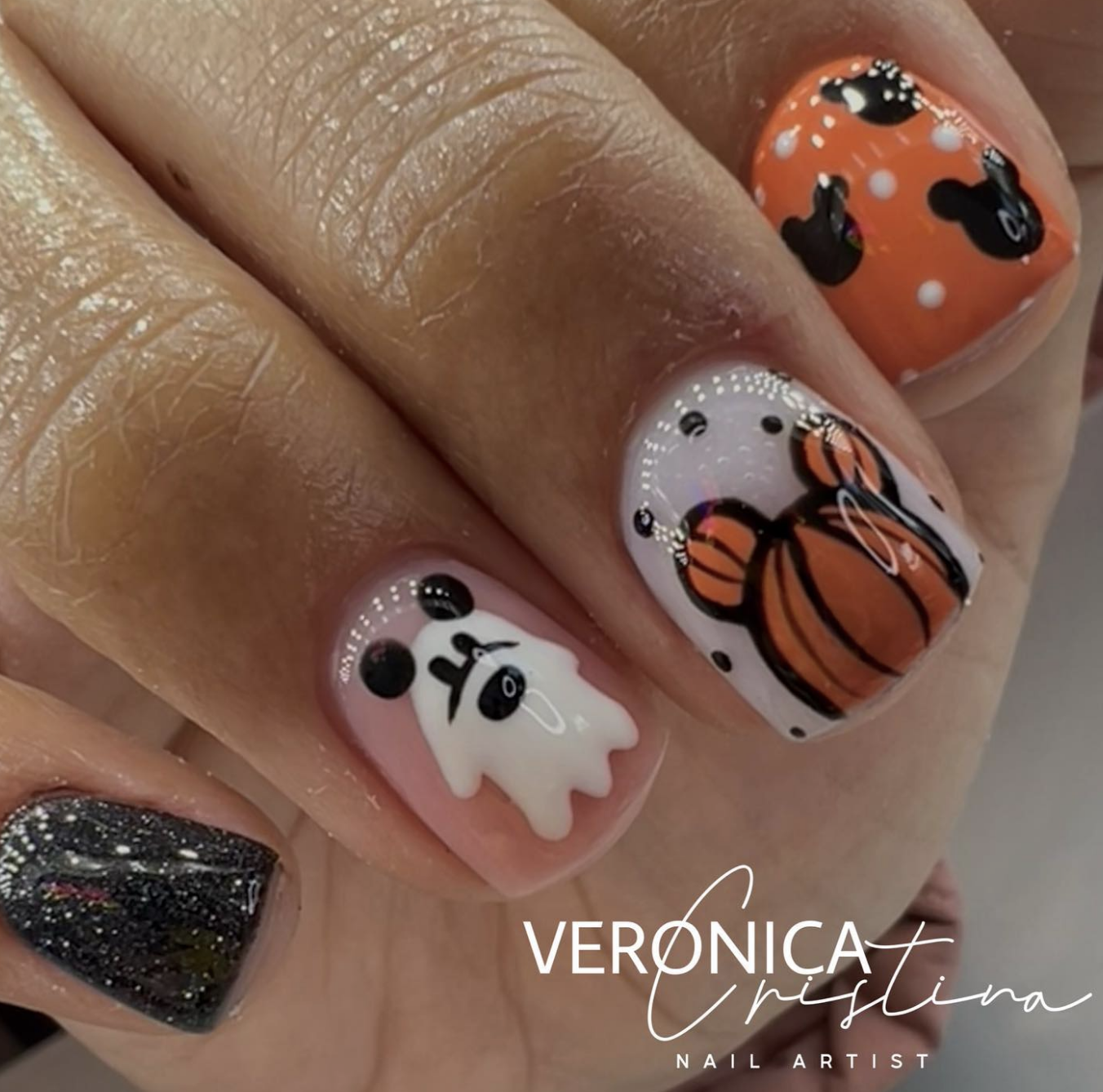 Overall, this nail art is perfect if you’re looking for something lighthearted and cheerful for Halloween. It’s ideal for short nails because the designs are compact yet packed with detail. The mix of glitter, iconic Halloween characters, and fun nods to Disney theme park magic make these nails an absolute win for the spooky season!