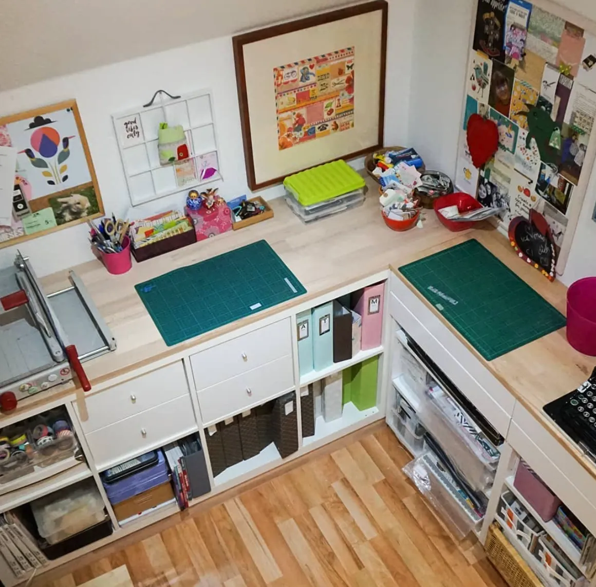 Corner workspace goals! Multiple work surfaces and built-in storage keep this space tidy while still offering room to spread out for larger projects.