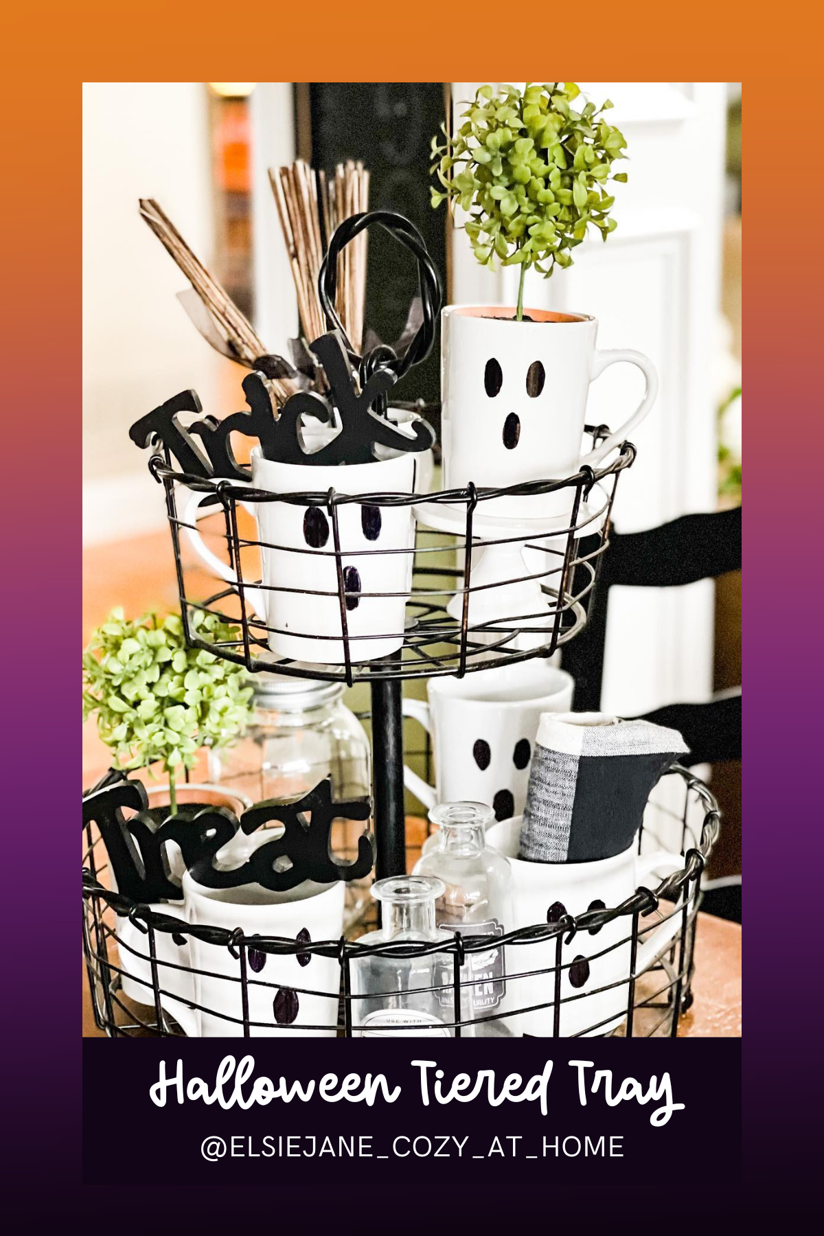 Minimalist yet charming, this ghostly tiered tray embraces a clean black-and-white aesthetic with cute ghost mugs, a pop of greenery, and the playful "Trick" and "Treat" signs, creating the perfect haunted coffee station!