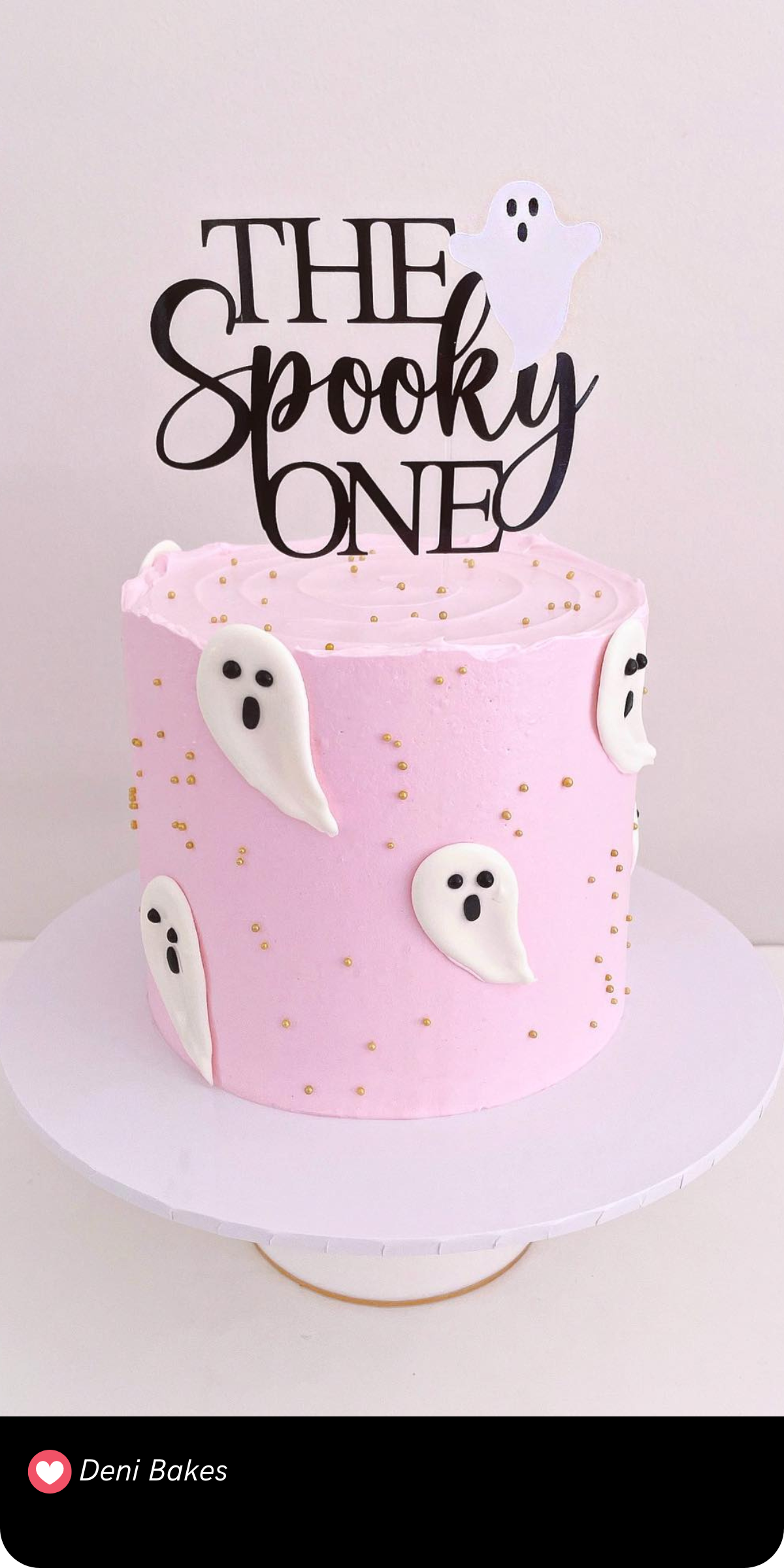 Simple and sweet, this pastel pink first birthday cake features classic ghost decorations and a stylish “Spooky One” topper. Perfect for a low-key yet cute Halloween-themed smash cake!