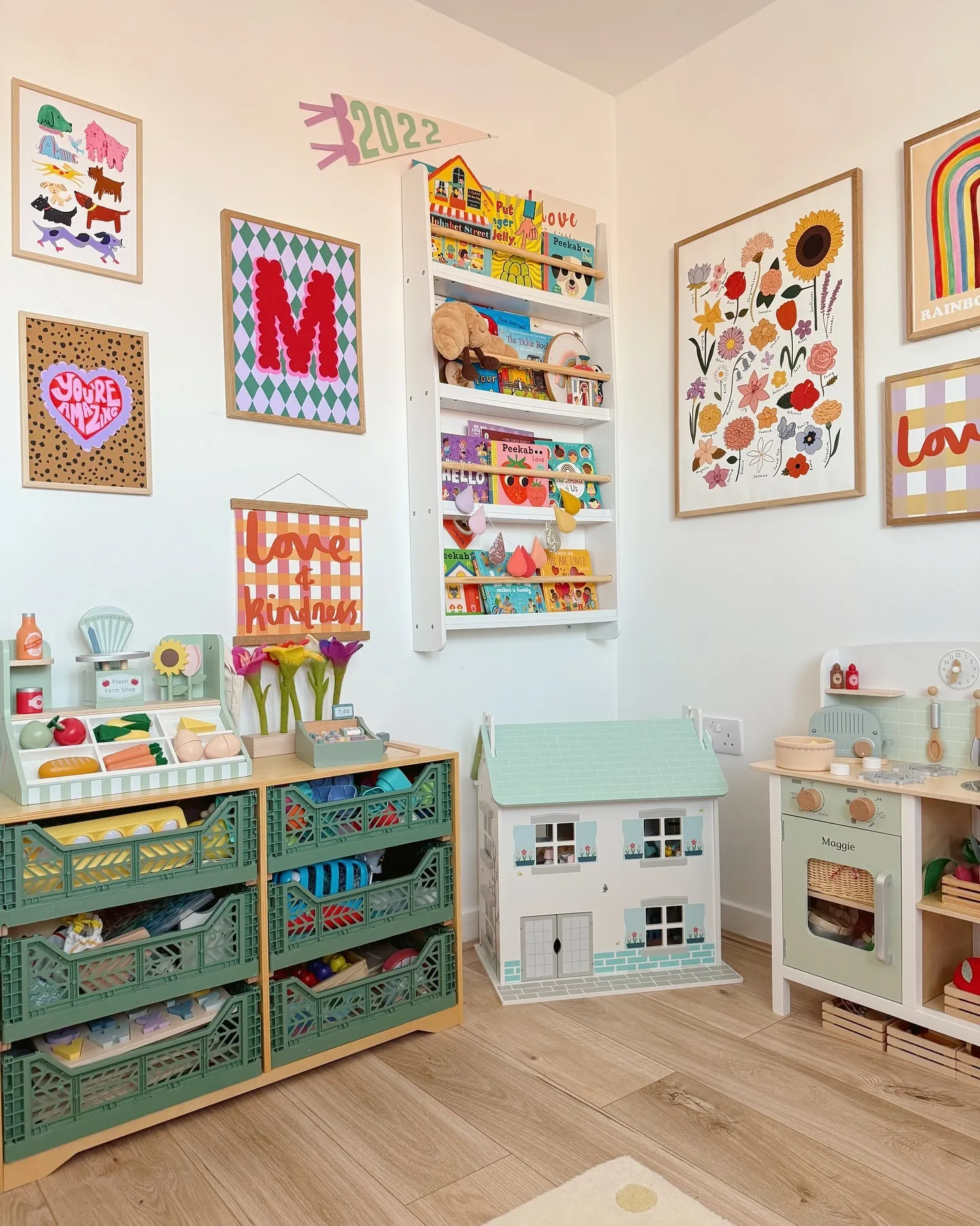 Colorful & Cozy Playroom – A beautifully styled play area packed with open storage, engaging wall art, and a mix of wooden and soft toys to encourage open-ended play.