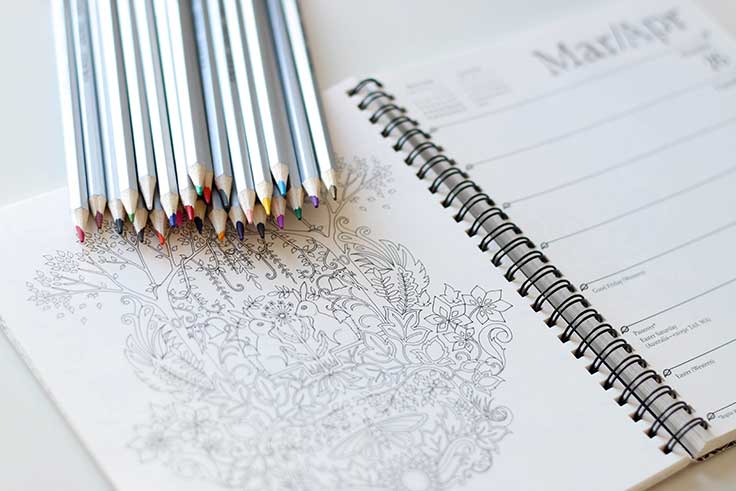 Combining coloring with journaling is a good example of how you can improve your mindfulness