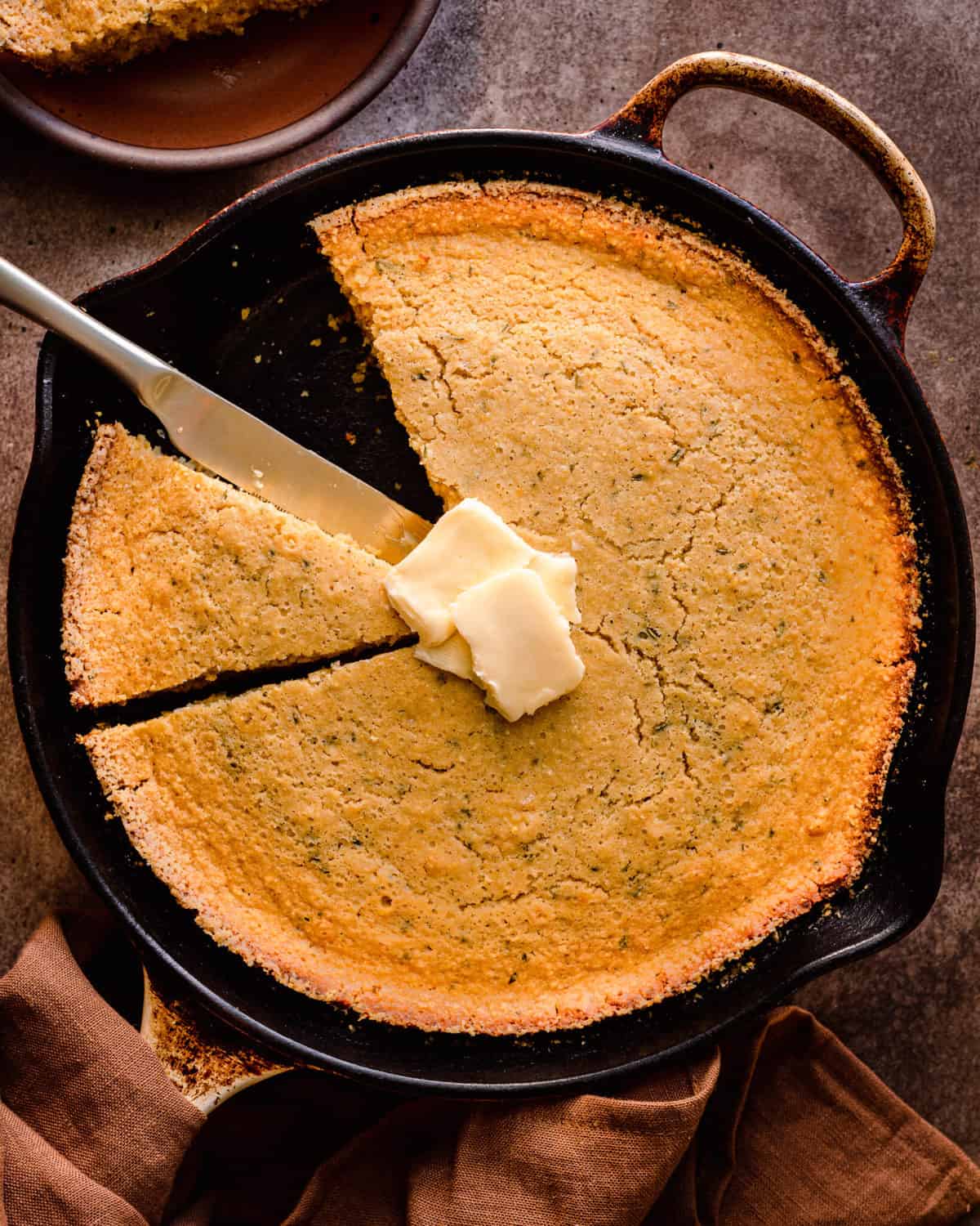 Moist and slightly sweet, this cornbread is the perfect companion for soups, stews, or as a stand-alone snack. Made with plant-based milk and vegan butter.