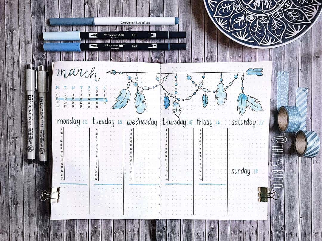 Vertical weekly spread with decorative header