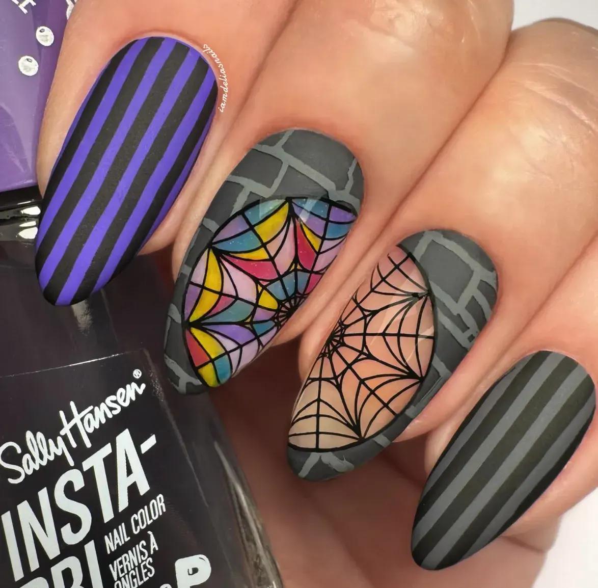 This stunning design combines Wednesday’s gothic stripes with vibrant stained-glass spiderwebs inspired by Nevermore Academy’s windows. It’s dark, detailed, and totally mesmerizing.