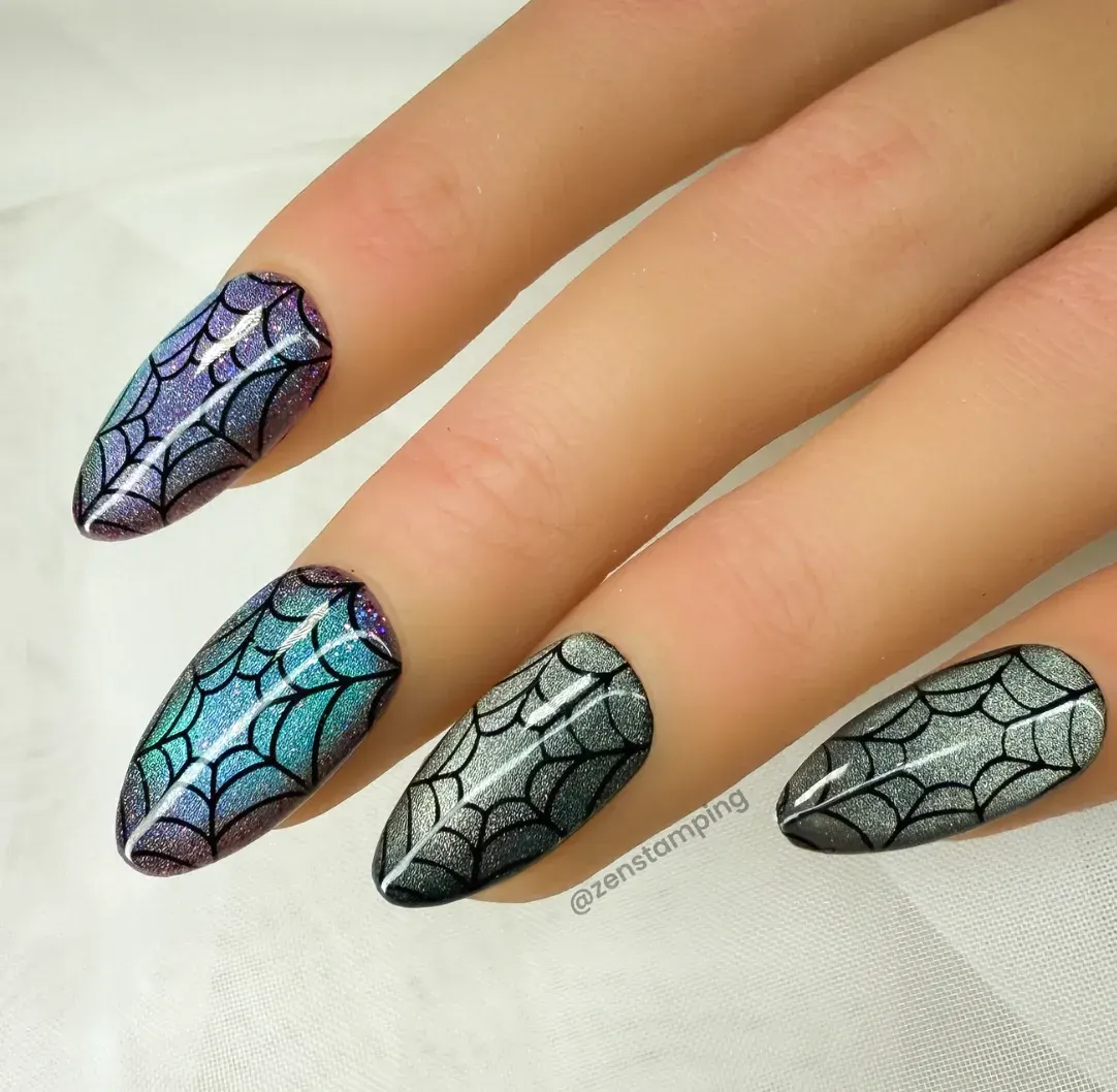 For a glam twist on Wednesday’s classic look, go for holographic polish with fine black spiderweb detailing. It catches the light beautifully — and proves spooky can still sparkle.