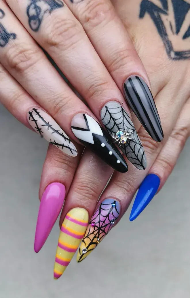 A mix of everything: stripes, webs, matte blacks, and even a pop of pastel. It’s dramatic, detailed, and unmistakably Wednesday.