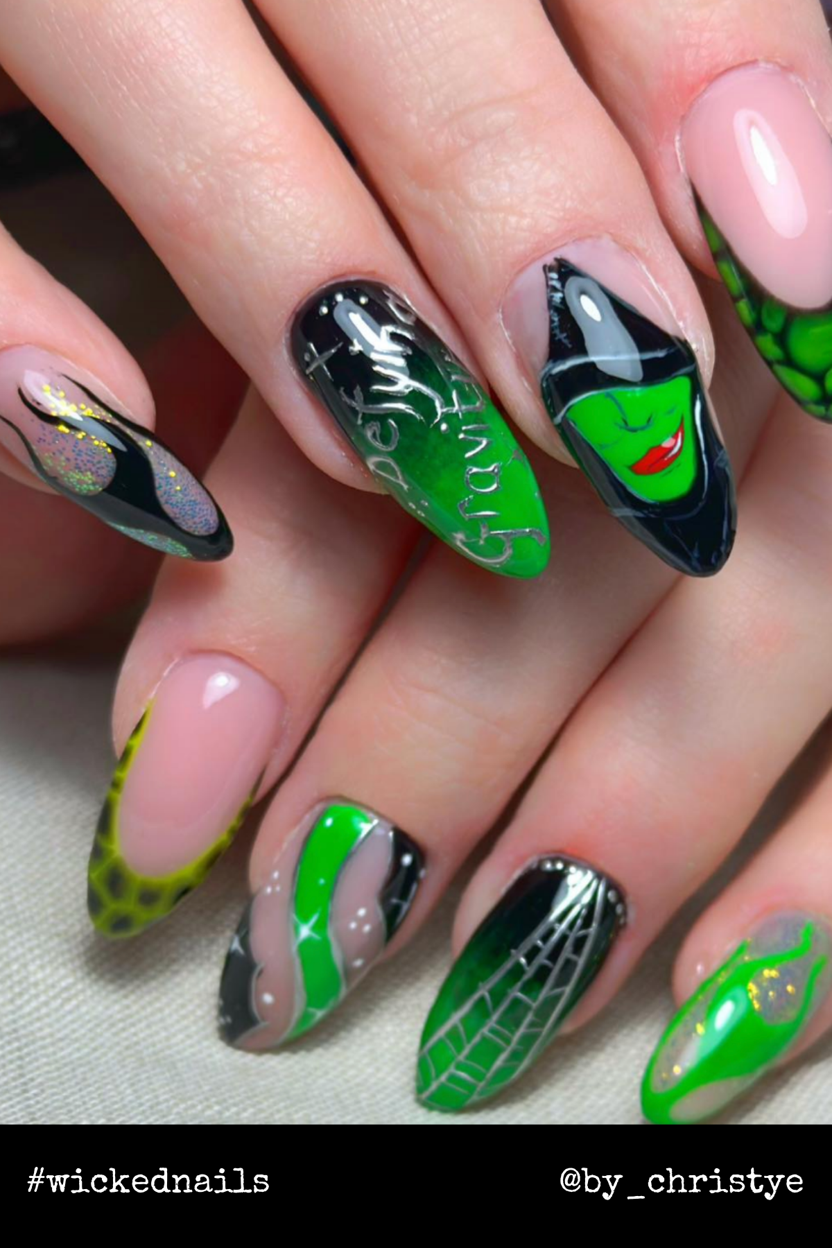 Intricately painted "Defying Gravity" details alongside Elphaba’s face make these nails a bold statement for fans of the musical.