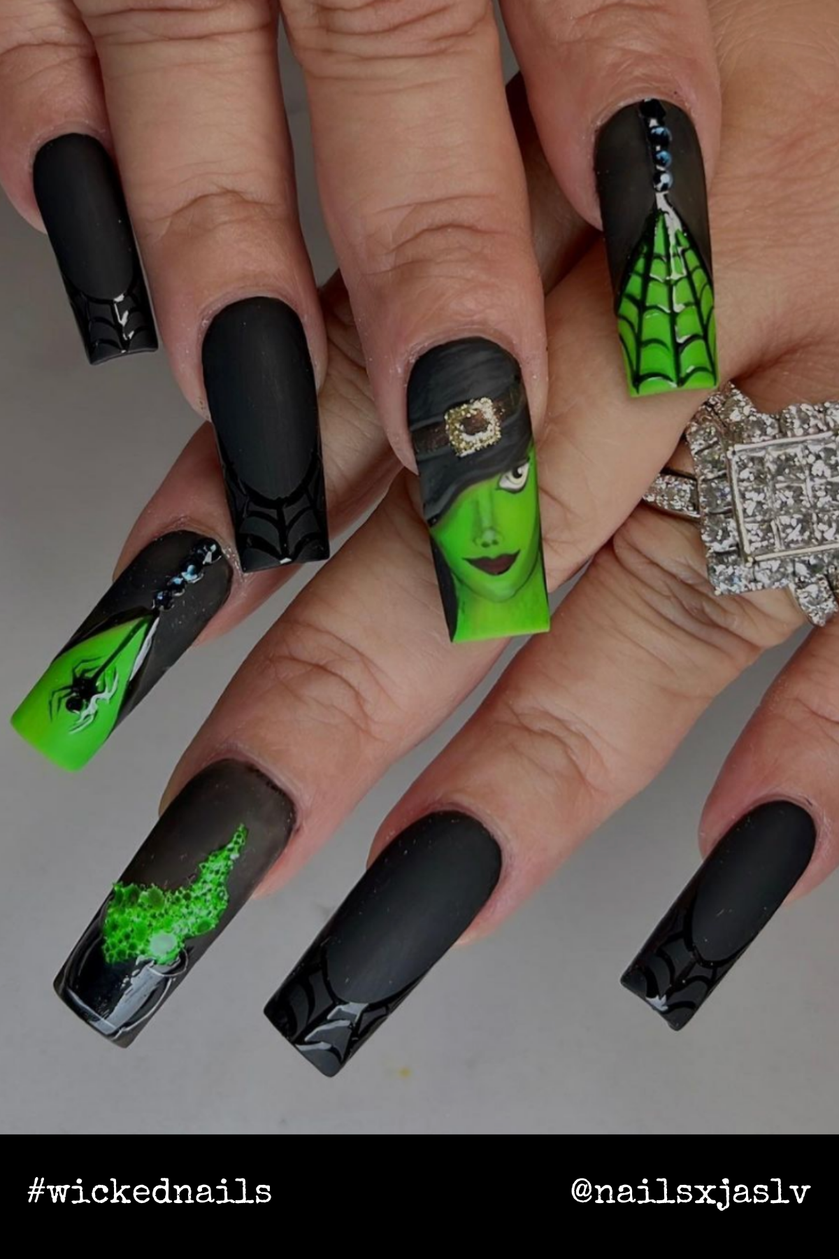 Long, coffin-shaped nails with spiderweb details, a dramatic Elphaba design, and shimmering green accents are perfect for an enchanting night out.