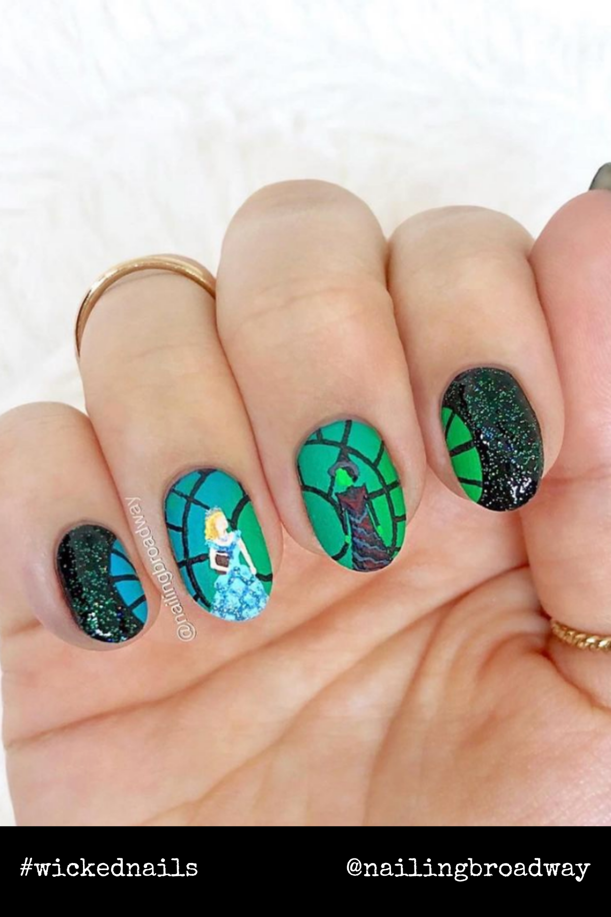 Stained glass-inspired greens and blacks create a stunning homage to Oz’s magical Emerald City.