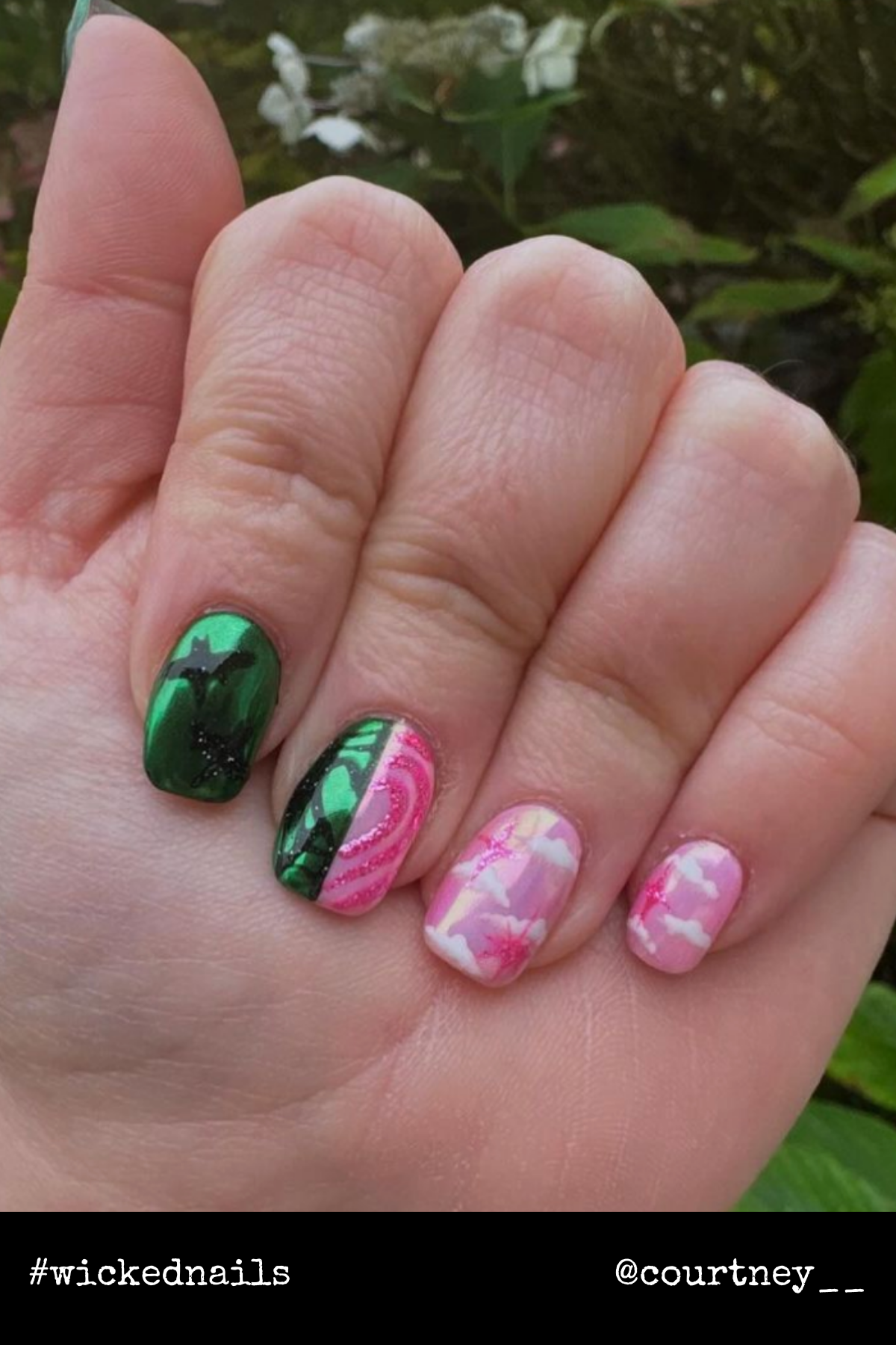 A mix of green swirls, pink hues, and glittery details creates a whimsical nail set that’s ready for the yellow brick road.