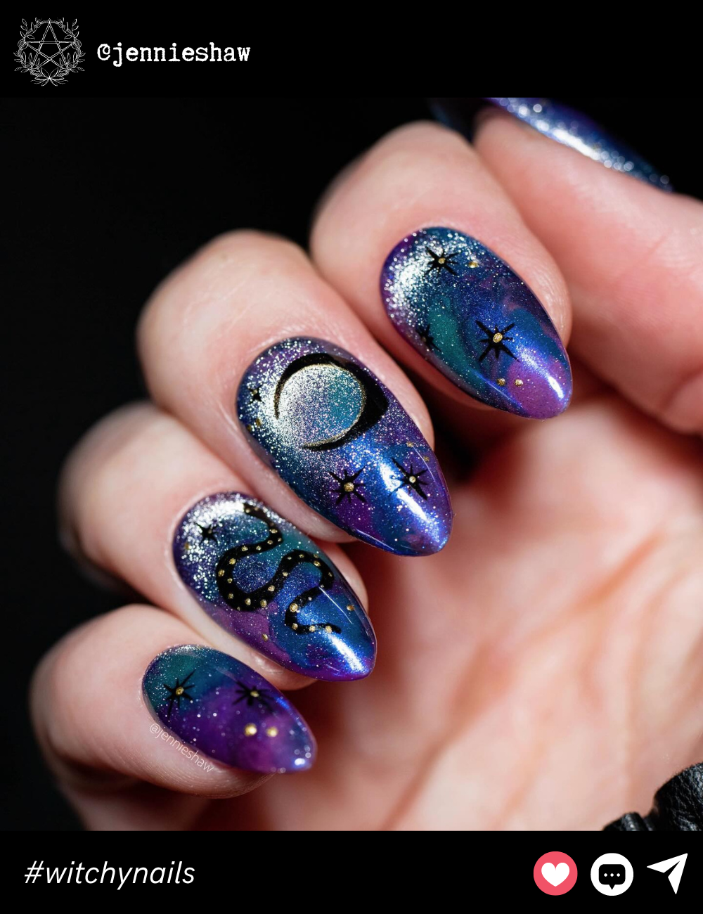 Galaxy Witch Nails on Medium Almond ShapeThese medium almond nails are like gazing into a mystical night sky. The deep blue and purple gradient, adorned with black stars and a snake, makes for an enchanting, magical design that’s perfect for stargazers and witches alike.