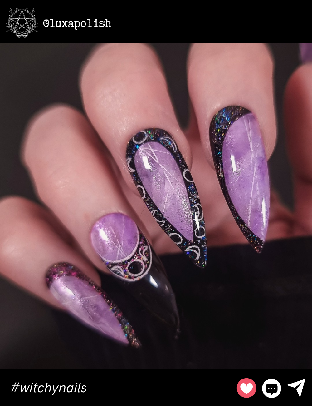 Purple Moonstone Witch NailsThese stunning, extra-long nails feature a mystical purple moonstone design with a black outline, giving off major magical energy. For those who love long, sharp nails and want to fully embrace their inner witch.