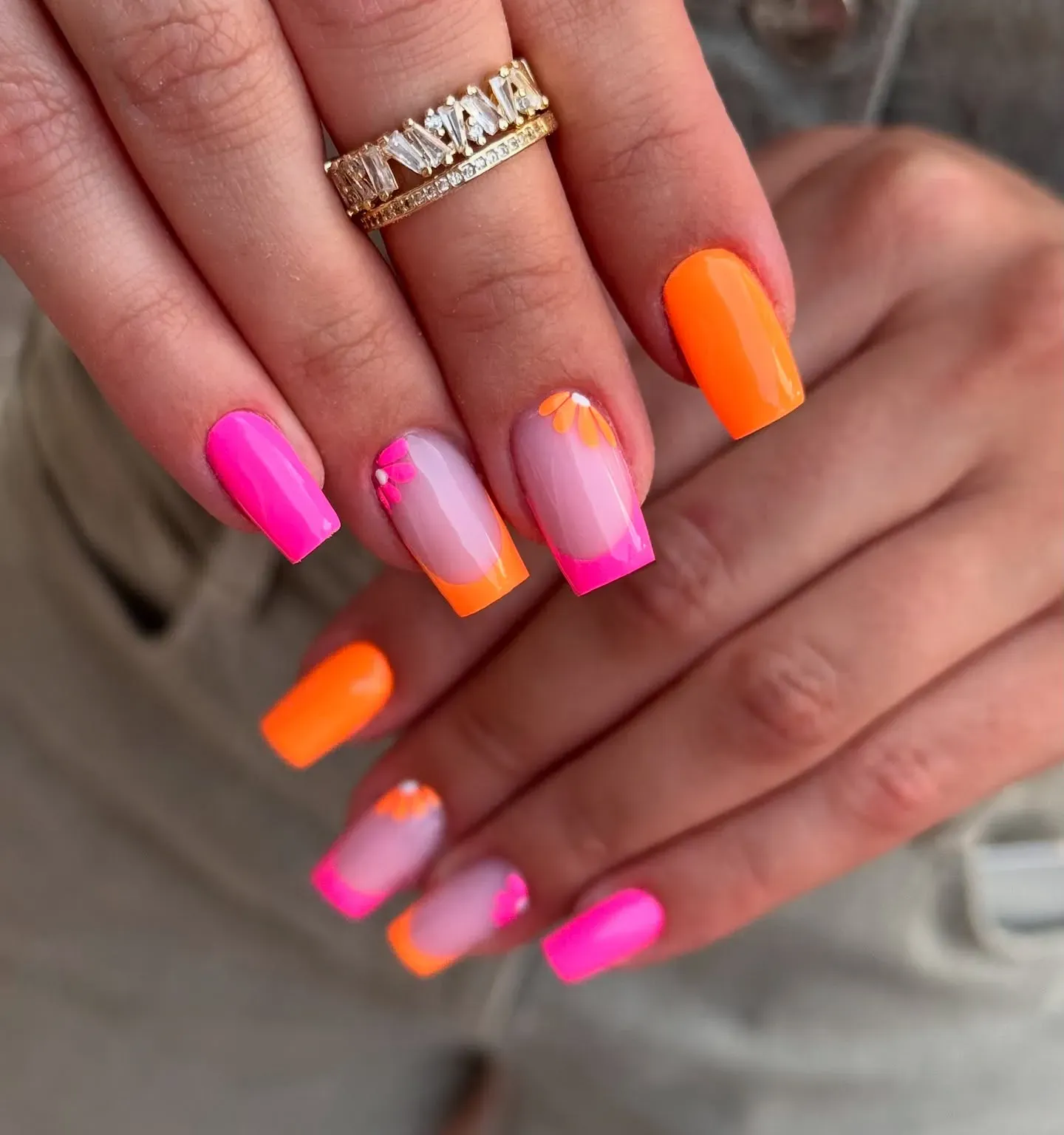 Hot pink and orange blend beautifully in this fun floral French — perfect for sunshine days and happy vibes.