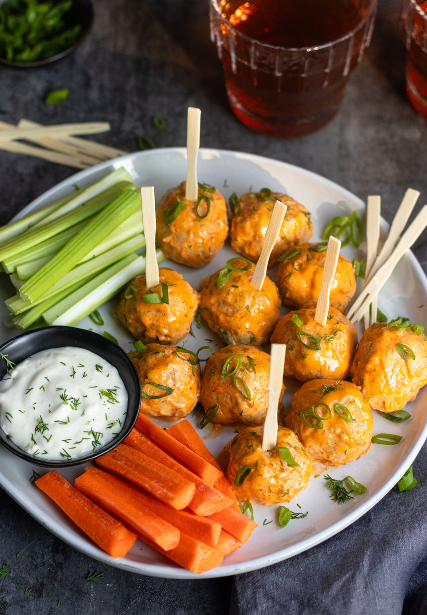 Made with ground chicken and baked to perfection, these meatballs are tossed in a lighter buffalo sauce. Serve as a snack or pair with roasted veggies for a balanced meal.