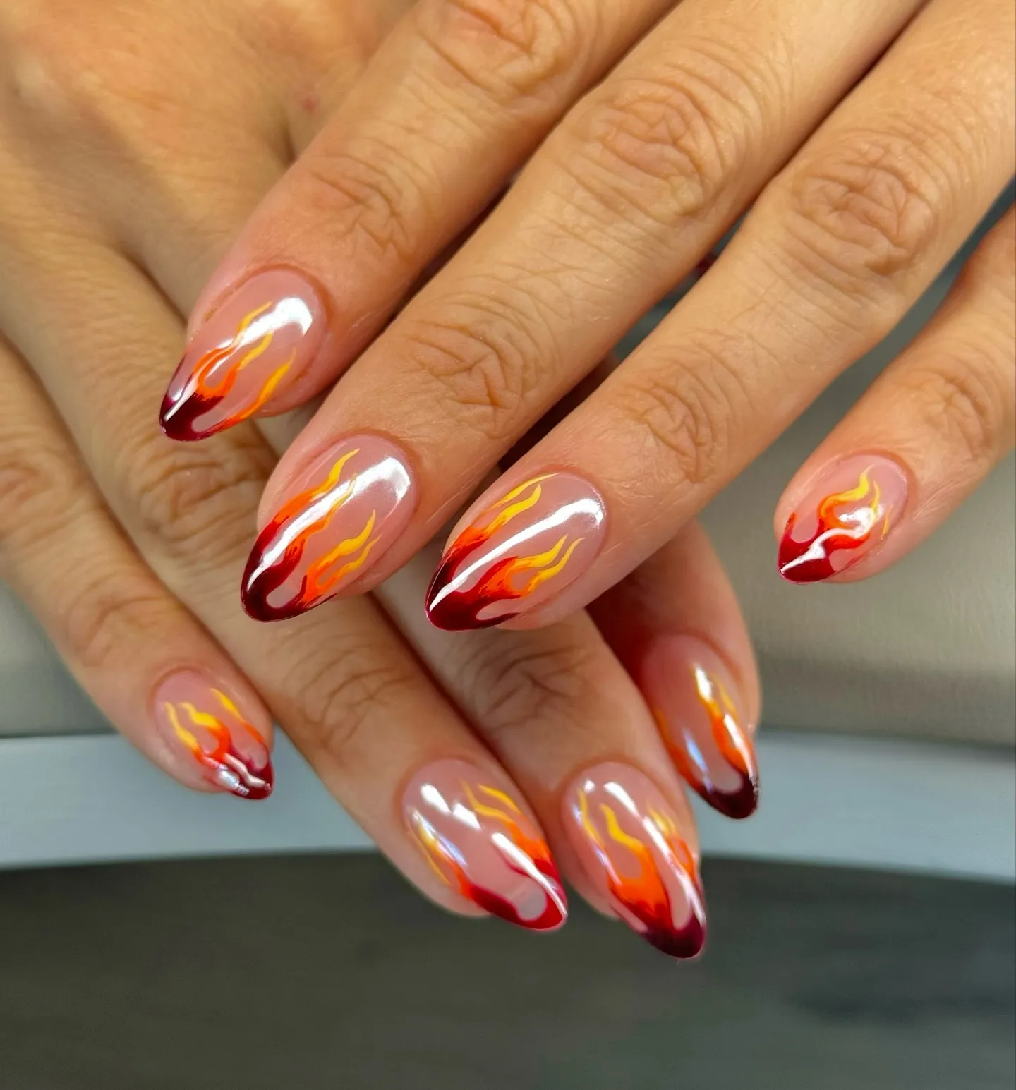 If you love rich tones, these red-to-gold chrome flames by @byjilow are giving smoldering sophistication. The metallic finish makes them the perfect fall version of the classic fire nail design.