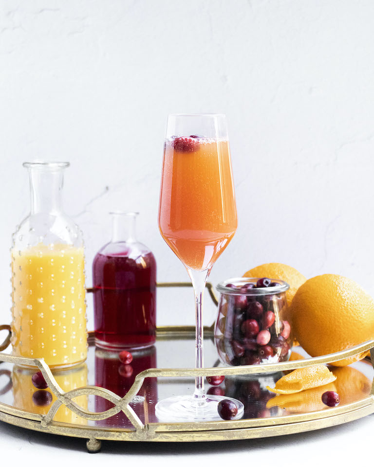 Add some sparkle to your Thanksgiving morning with this cranberry mimosa. It’s light, festive, and a beautiful color to boot!