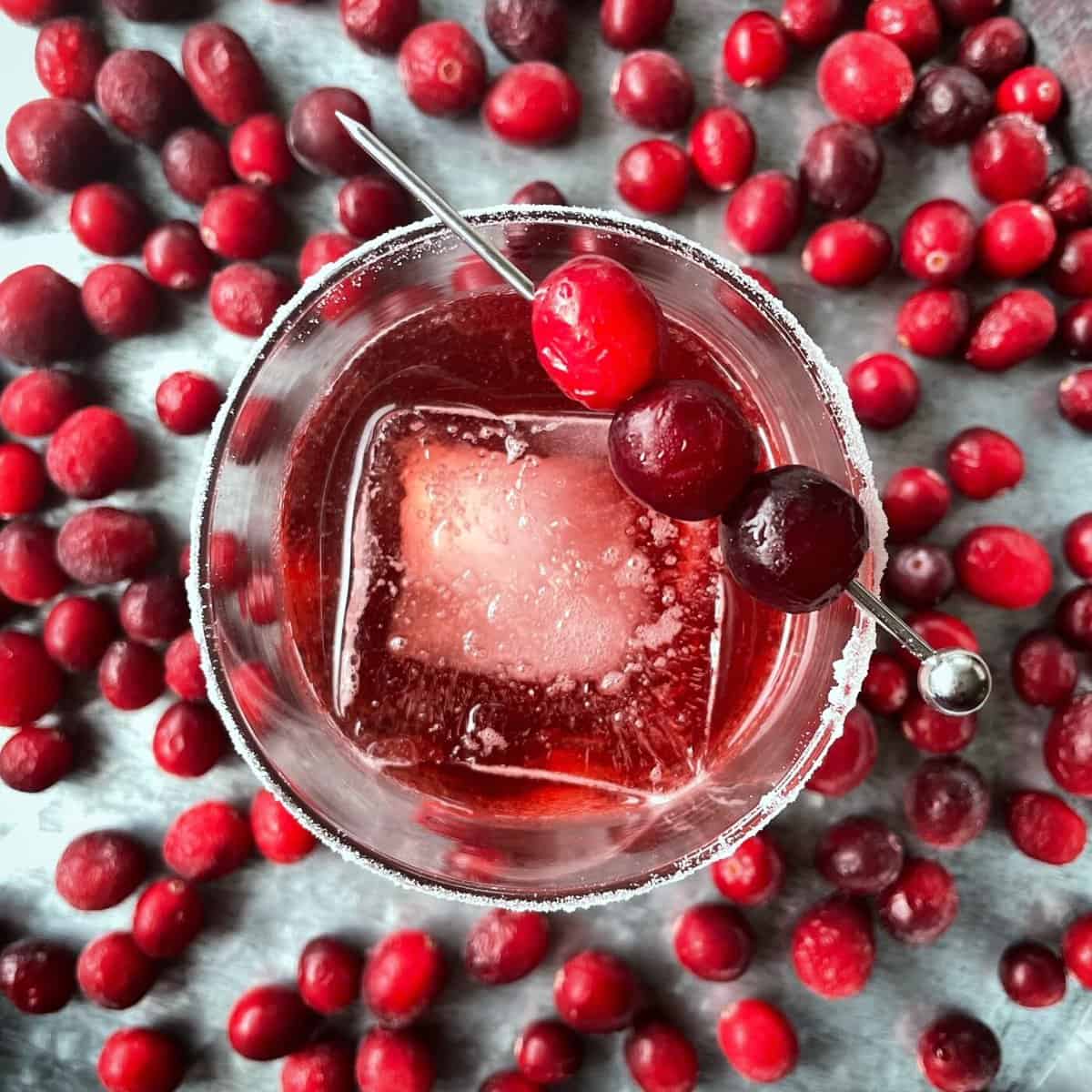 This cranberry twist on a Negroni combines gin with a touch of seasonal tartness. It’s bold, refreshing, and pairs well with savory Thanksgiving dishes.