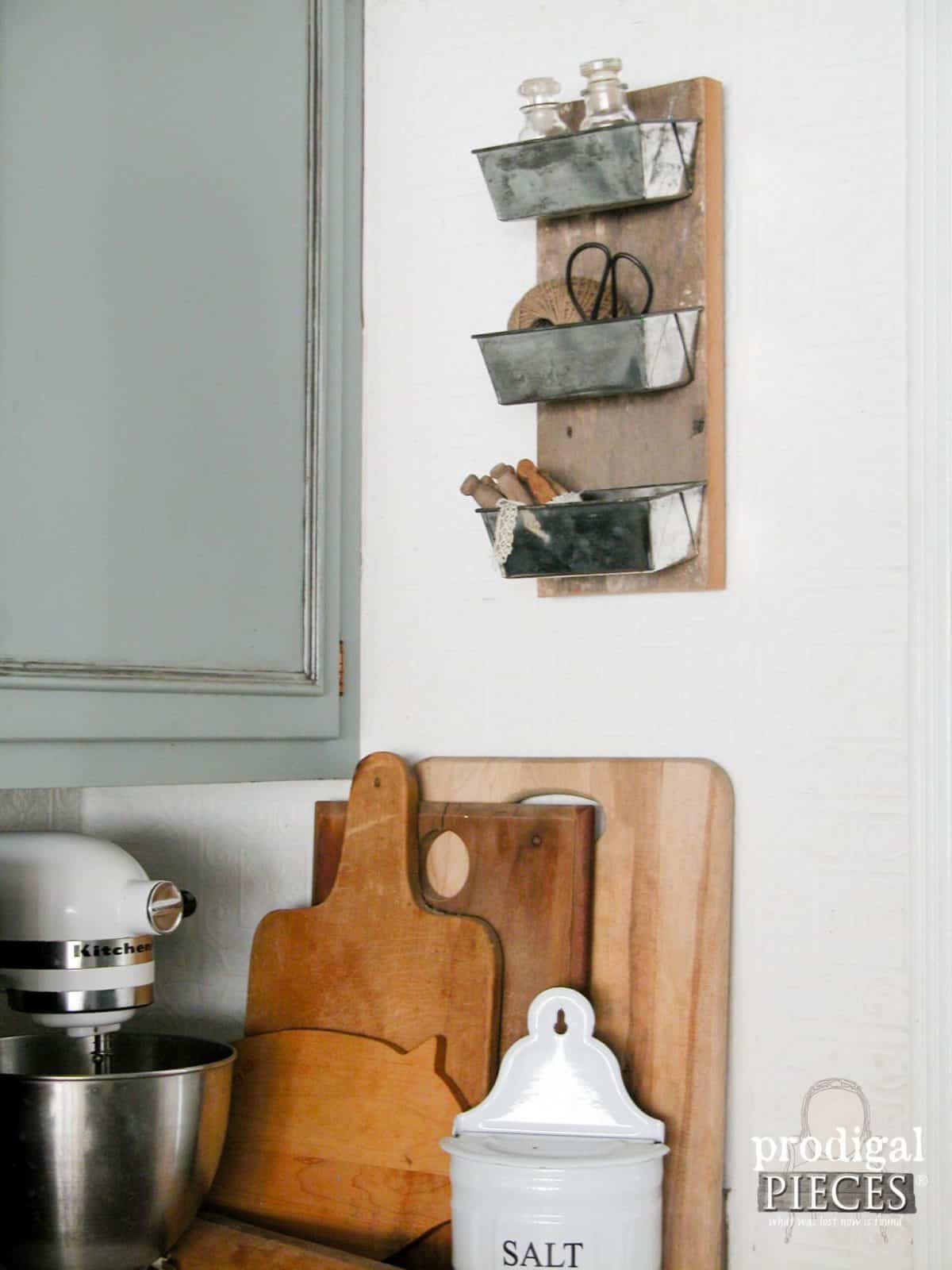 Transform vintage cake pans into kitchen wall storage