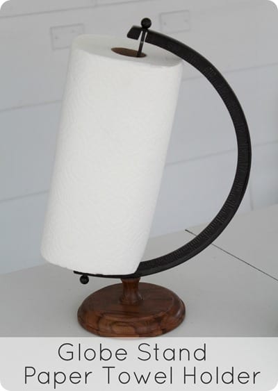 Turn an empty globe stand into a paper towel holder