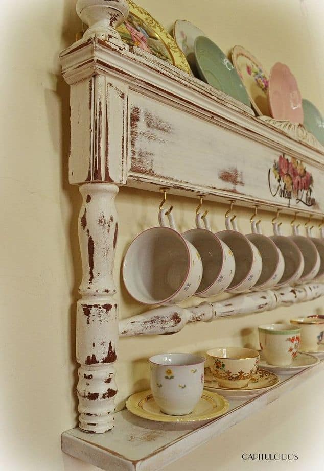 Take a footboard from a bed and transform it into a china display shelf for your kitchen