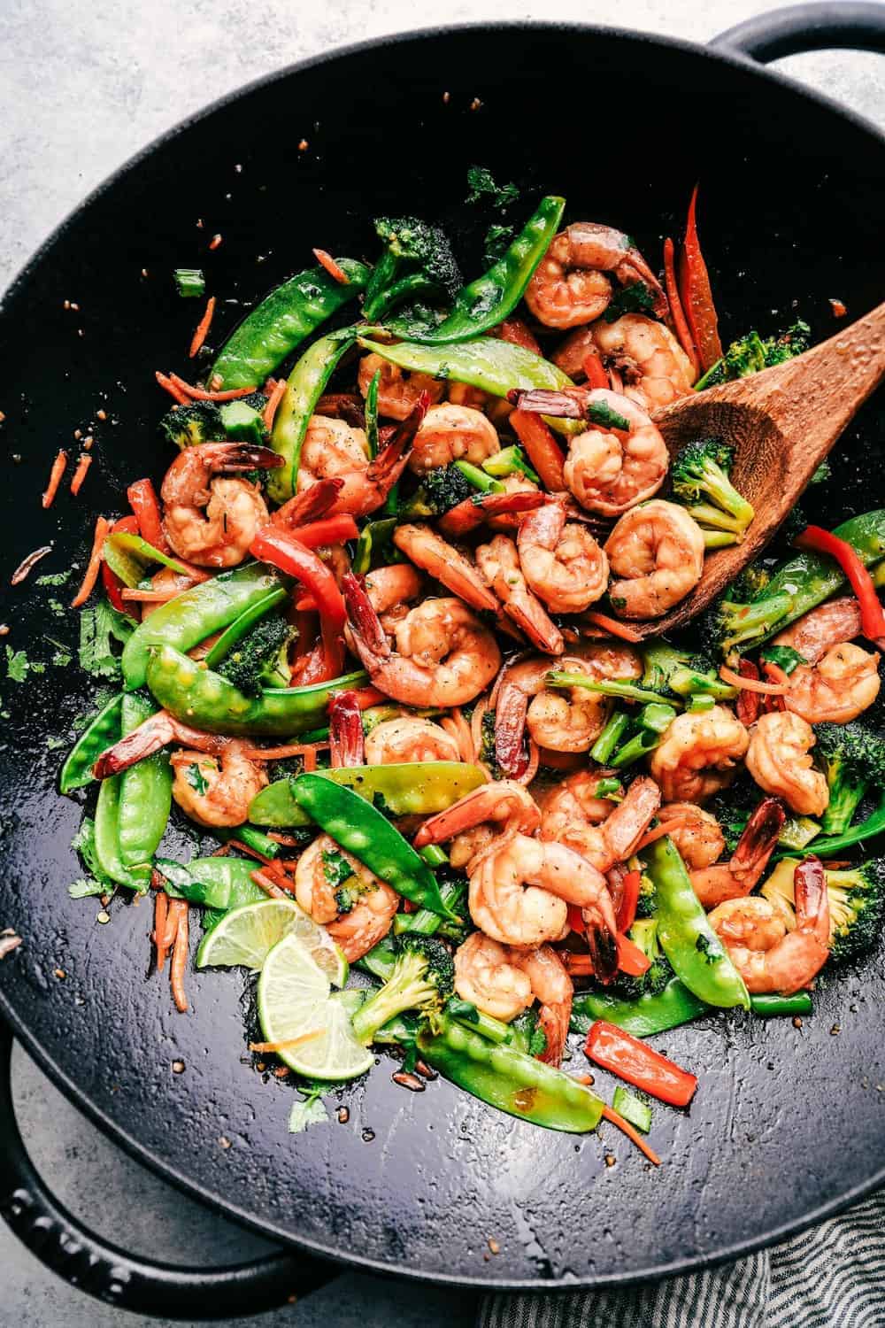 Quick, easy, and full of flavor, this shrimp stir-fry is a lifesaver for weeknight dinners. Toss in your favorite veggies and serve over rice or noodles.