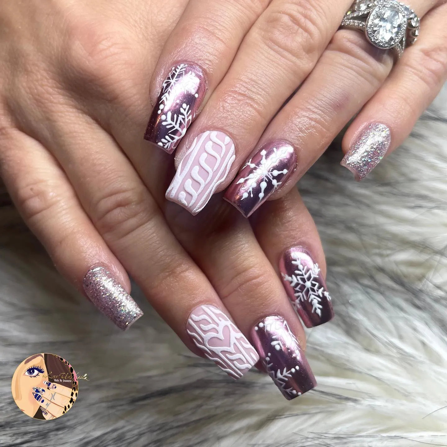 Rose chrome, white cable-knit, and snowflake accents? Yes please. This sweater print nail design mixes shimmer and texture perfectly for a cozy-meets-glam winter vibe. It’s giving light pink winter nails goals.