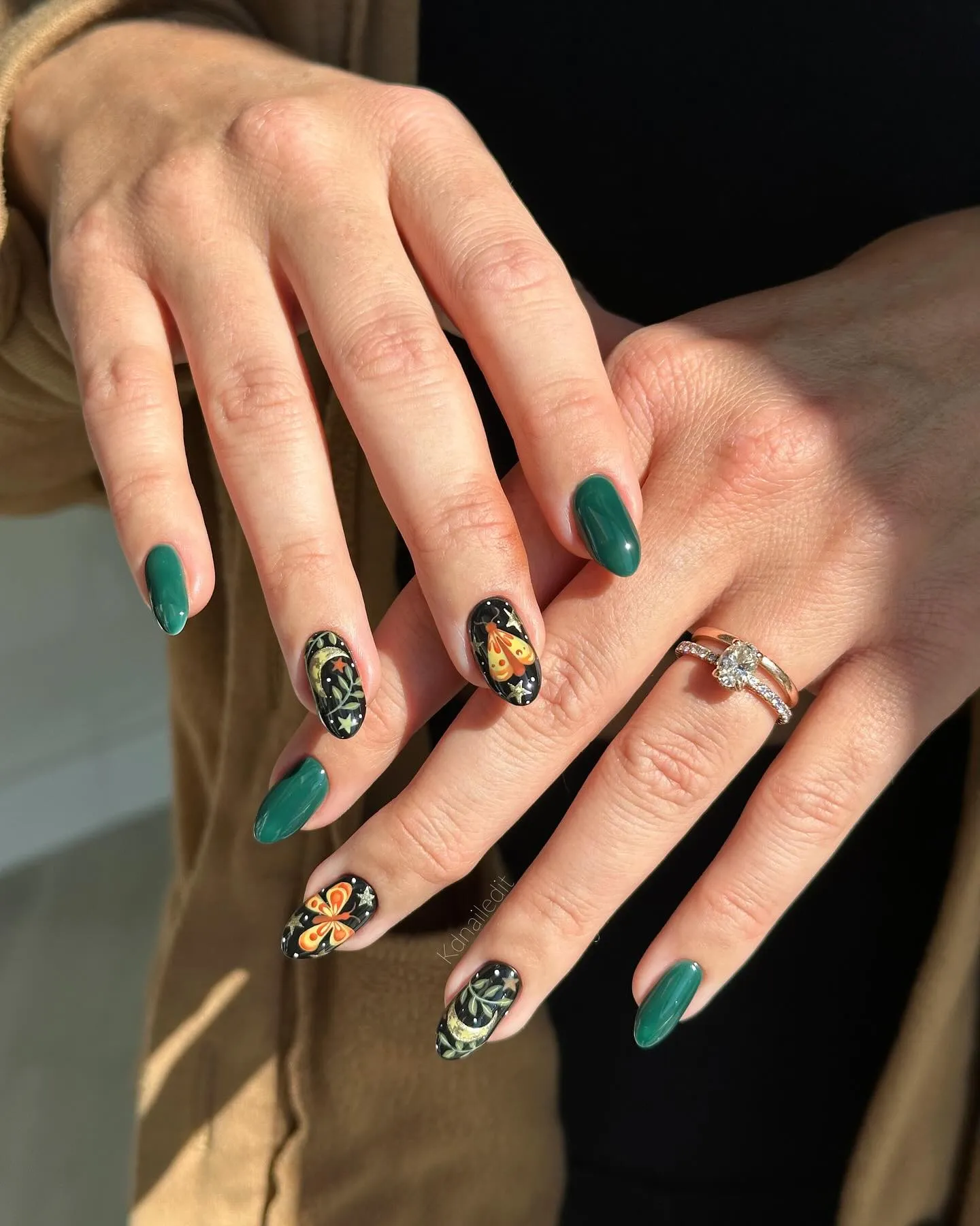 Green never goes out of style for fall, and these forest nails with detailed leaf and butterfly designs prove it. A stunning option if you’re after artsy autumn nails inspiration this year.