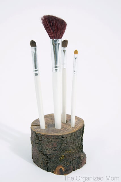 Next time your kids want to collect wood turn it into a makeup brush holder