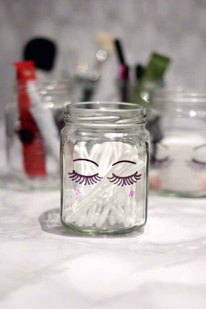 Glass jar plus Sharpie marker equals SUPER cute makeup storage