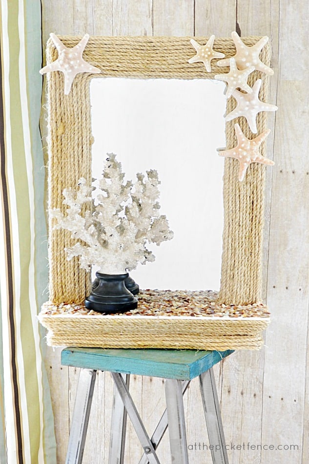 Use rope and starfish to make a nautical themed mirror