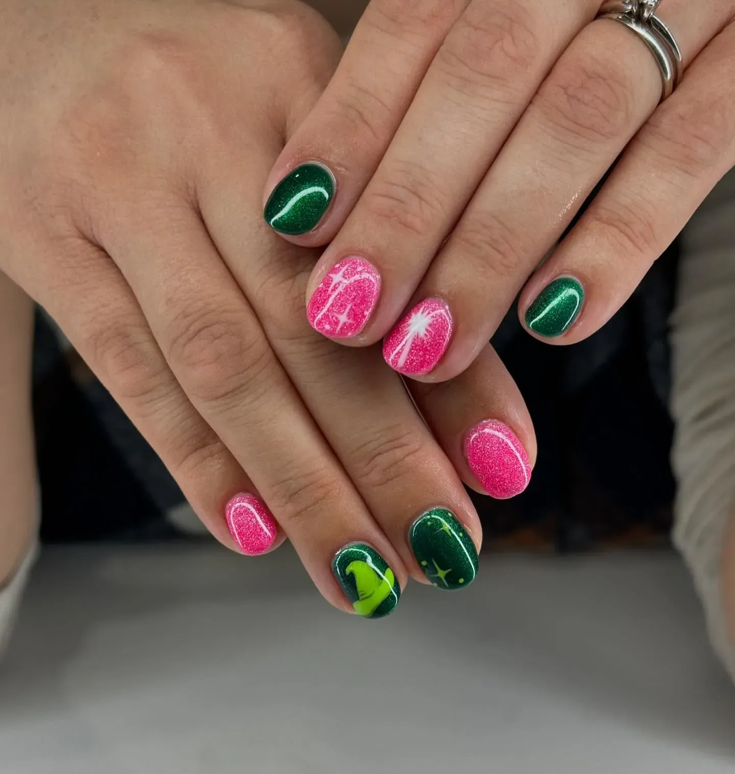 Metallic green, clock-face detailing, and gold linework — these nails capture the mysterious magic of the Time Dragon and Elphaba’s rise.