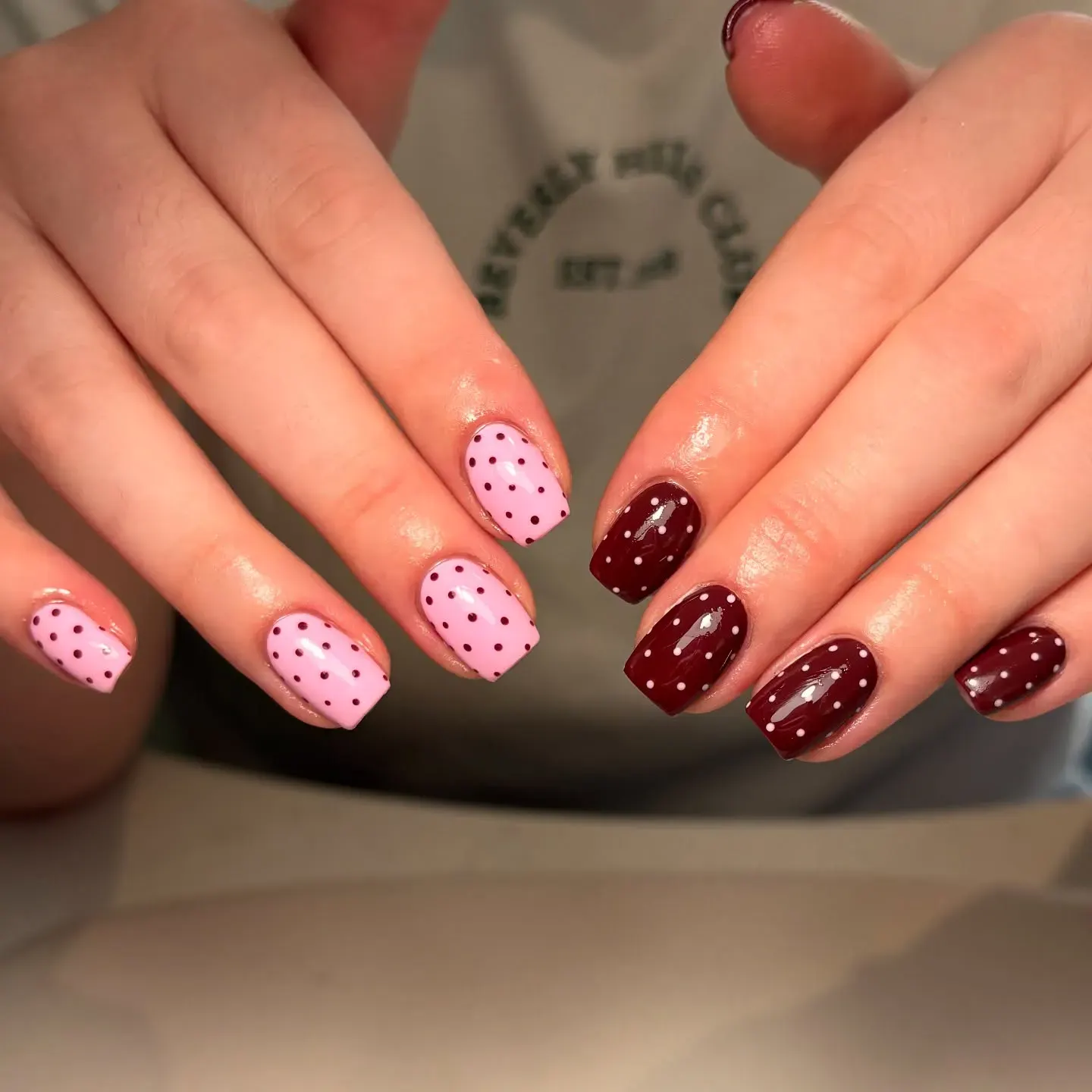 A fun and flirty combo of bubblegum pink and deep burgundy, all dotted up for a look that’s equal parts sweet and sultry.