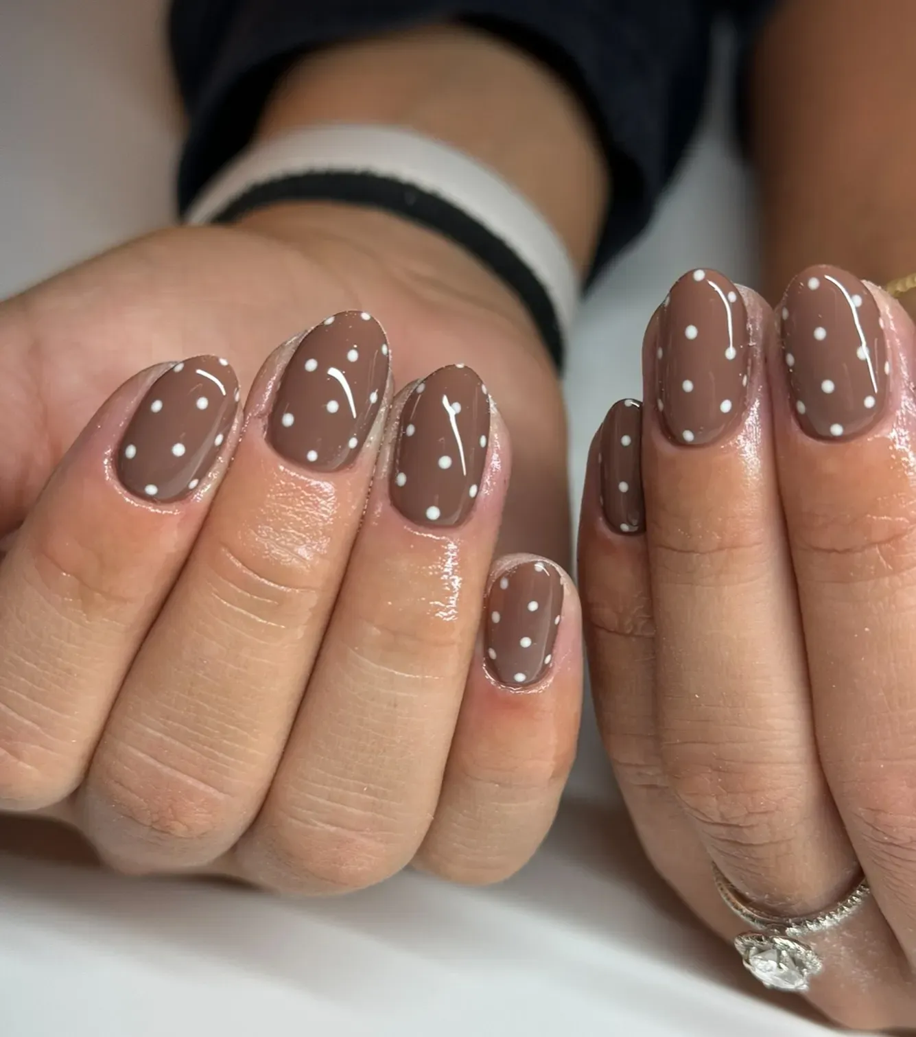 If you love cozy sweater tones, this taupe mani with crisp white dots is for you — timeless, neutral, and oh-so-pretty.