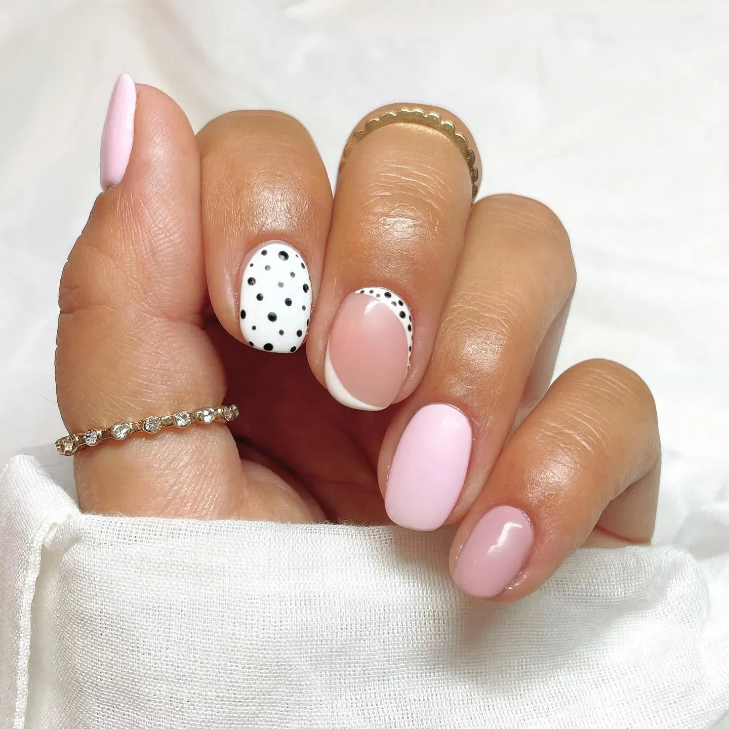 Minimal, polished, and perfect for any occasion — soft blush paired with a single polka dot accent nail feels effortlessly elegant.
