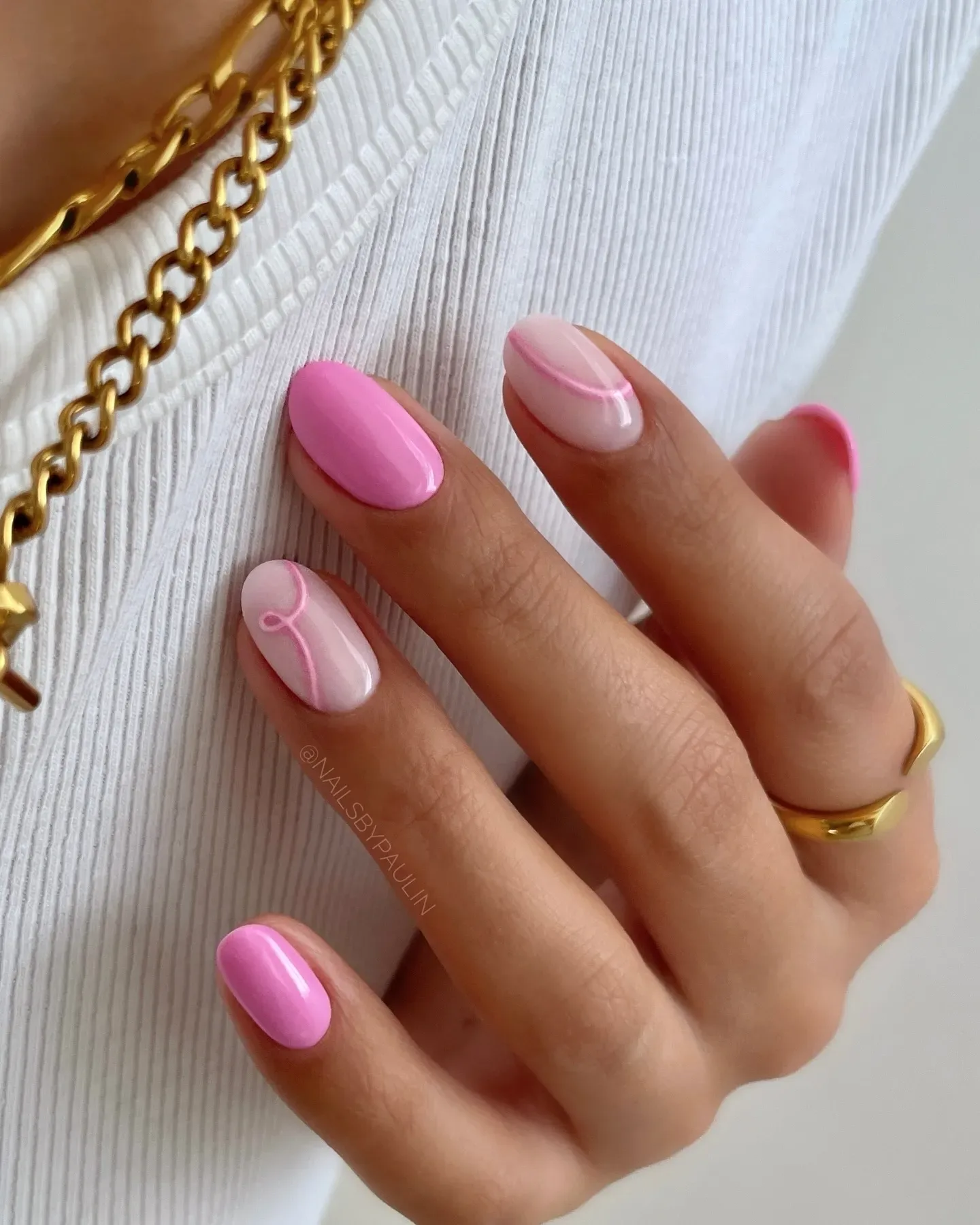 This soft and minimal pink nail inspo idea uses a single fine line to create movement and shape. Clean, modern, and perfect for those who love understated beauty.