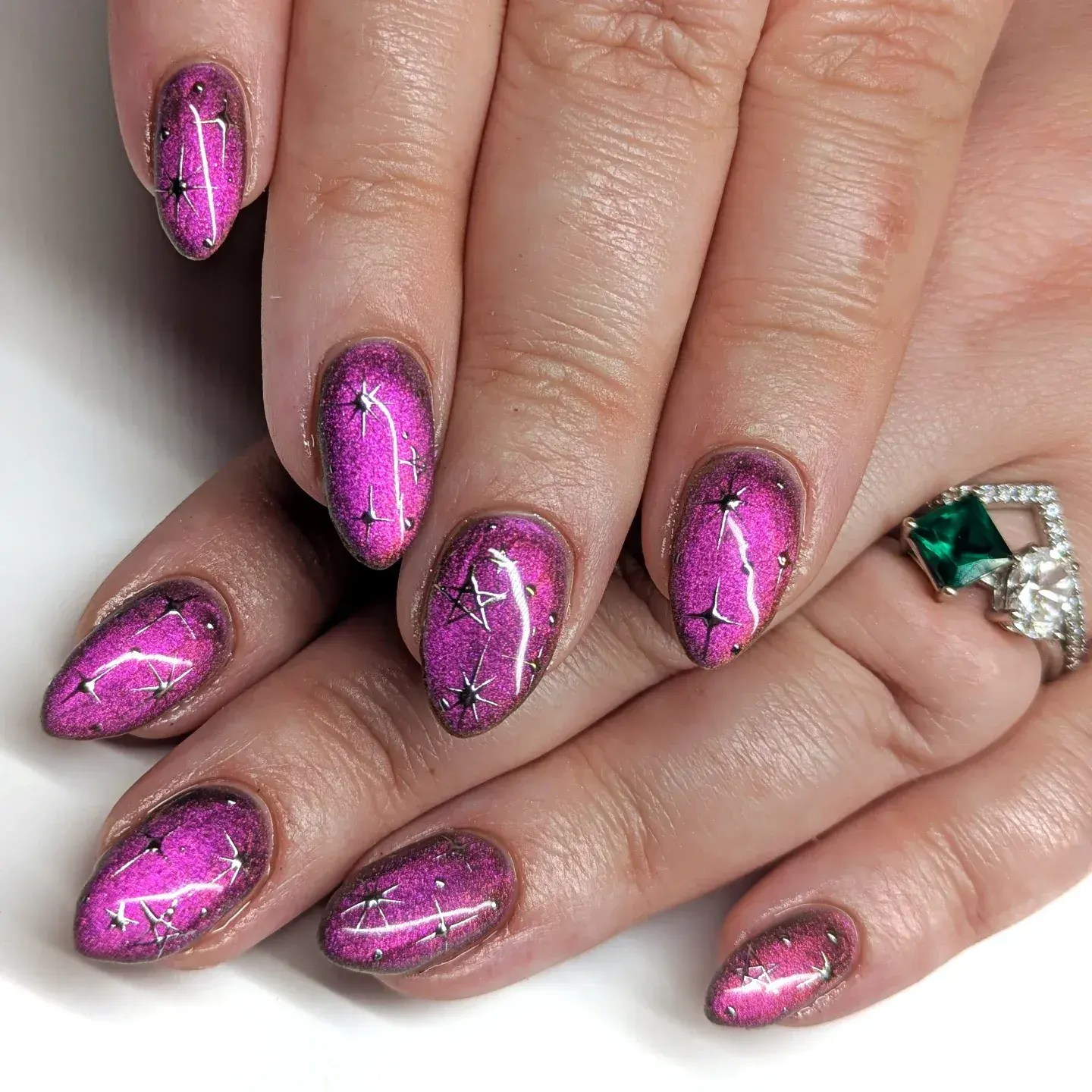 Magenta shimmer nails sparkle with silver star constellations β a pink galaxy-inspired twist thatβs perfect for crisp autumn nights. ππ«