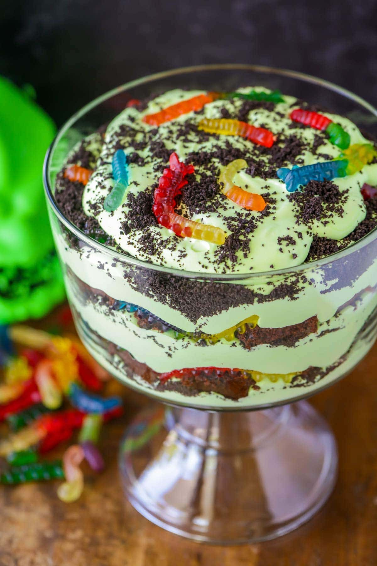 Inspired by the infamous Oogie Boogie from The Nightmare Before Christmas, this trifle is frightfully fun! It’s loaded with gooey chocolate cake, neon green pudding, and crushed cookies, making it a creepy yet cute addition to any Halloween party. Don’t forget the gummy worms for that extra eerie touch!