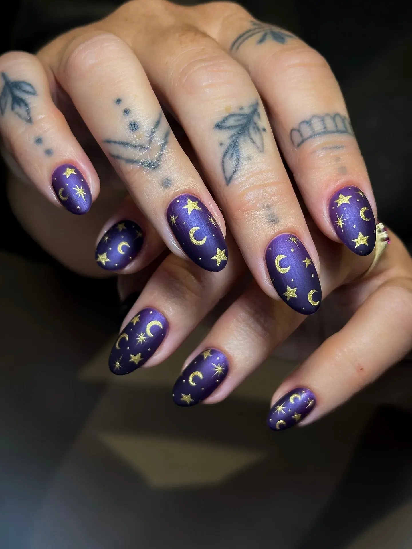 Matte plum nails dusted with gold moons and stars โ soft, mysterious, and stunning. These fairytale-inspired nails are pure witchy goddess energy. ๐ฎ๐