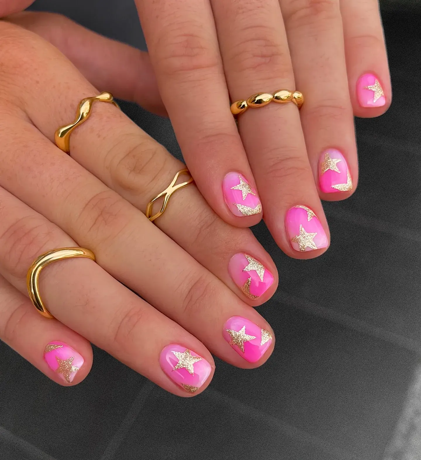 These baby pink nails with gold glitter stars feel both whimsical and polished. A great choice for elegant nails that still have that playful sparkle.
