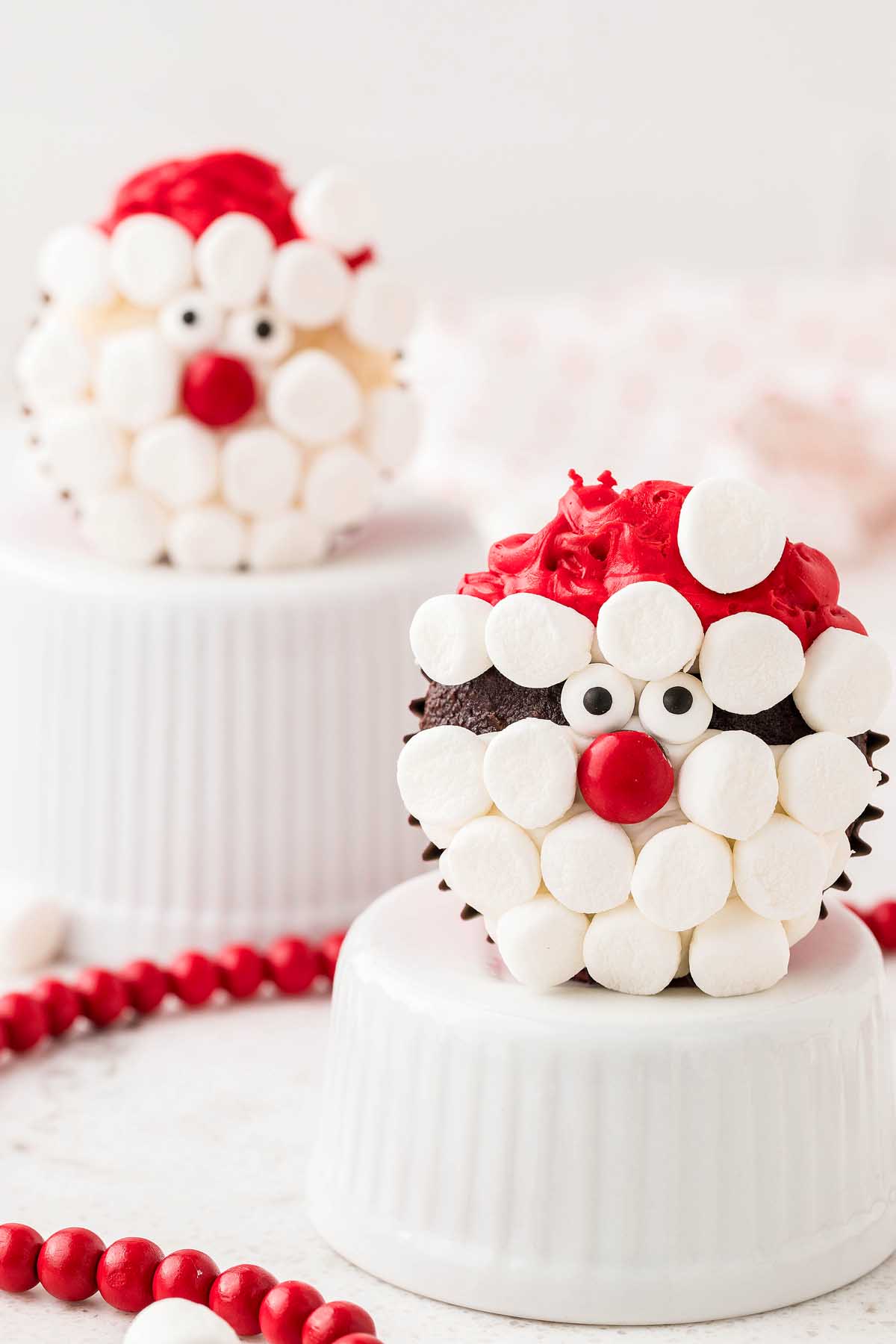 Jolly old St. Nick gets his own cupcake in this adorable recipe! With a red suit and a fluffy beard made from frosting, these are a must-try for Santa fans.