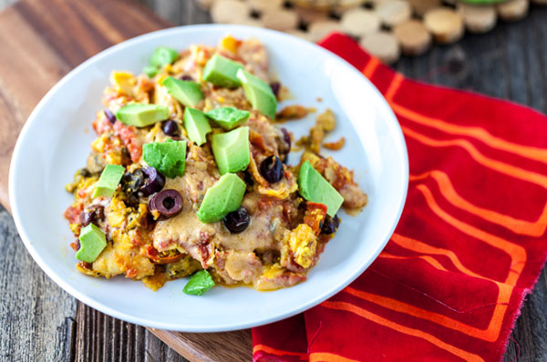 Nacho Cheese Enchiladas from http://keepinitkind.com/nacho-cheese-tofu-scramble-enchiladas/