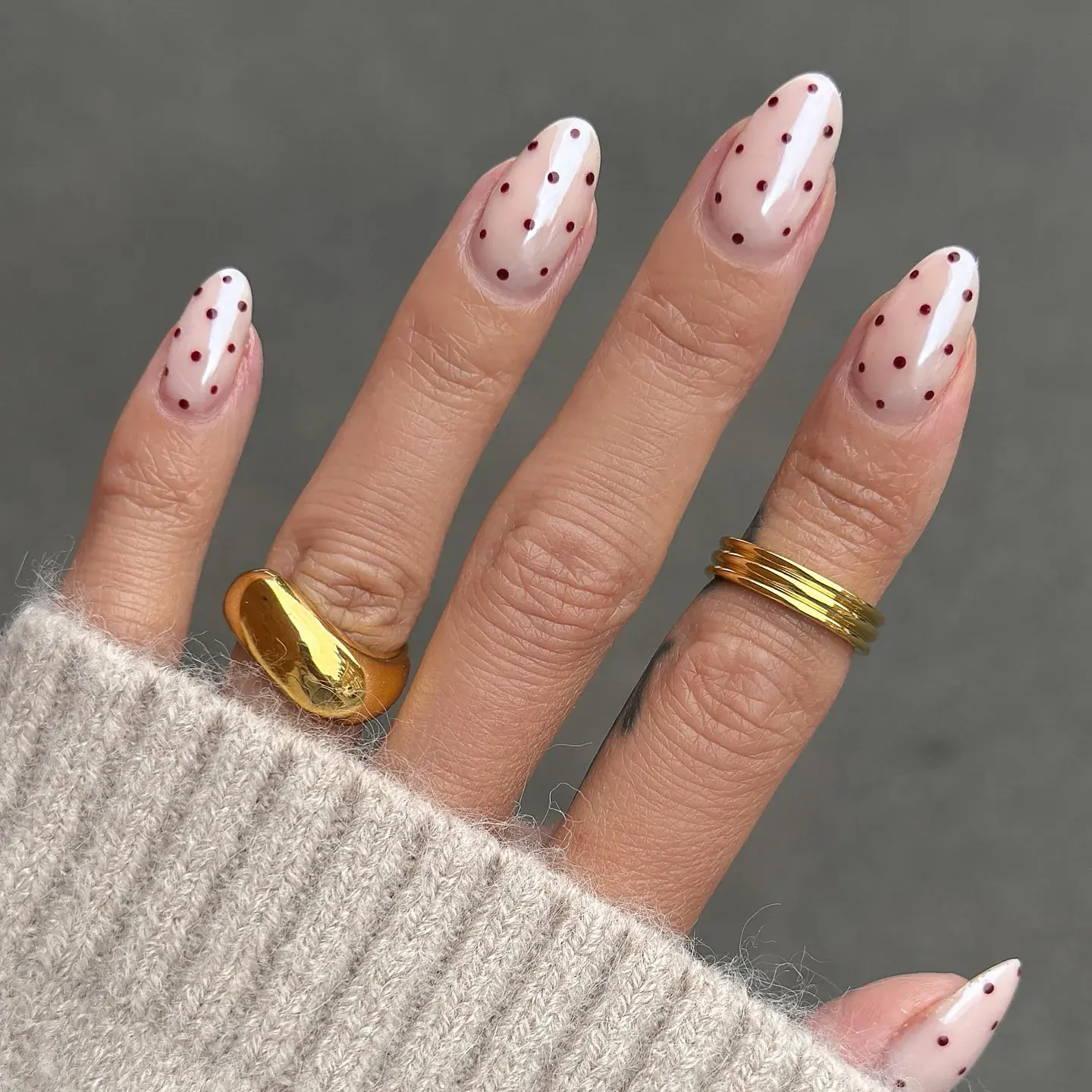 Barely-there blush and deep wine red create the dreamiest fall contrast — proof you can be bold and classy at the same time.