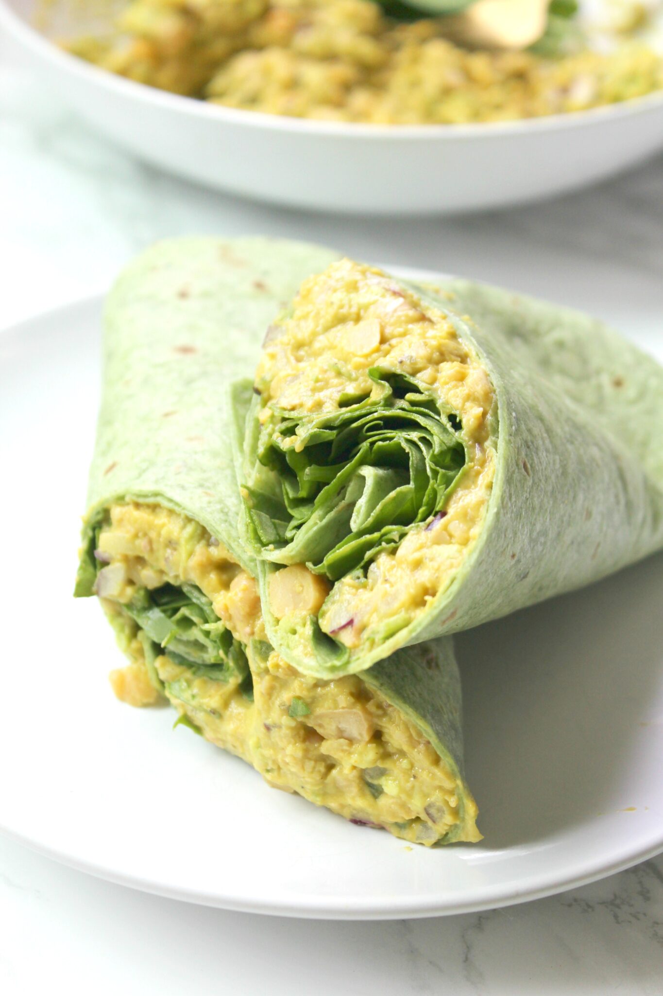 Light yet filling, these wraps bring the creamy goodness of chickpea salad with a crunch of fresh veggies.