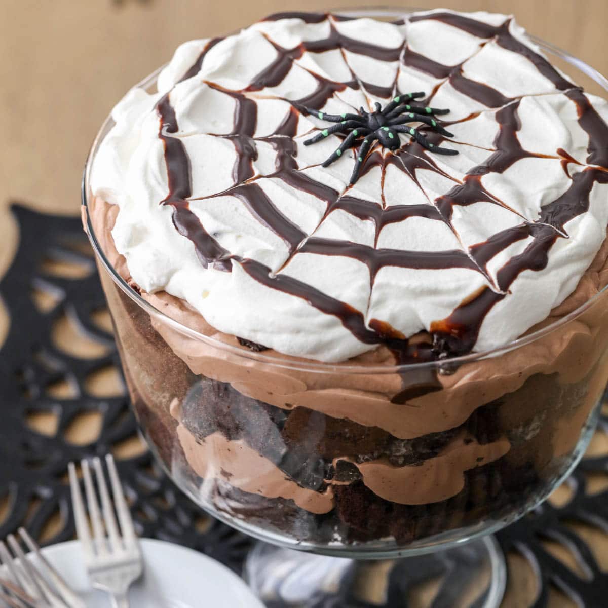 This creepy crawly treat is all about the chocolate! Layers of rich chocolate cake, creamy pudding, and crushed Oreos create the perfect spooky bite. Topped with candy spiders, it’s a fun and kid-friendly trifle that’ll steal the show at your Halloween dessert table.