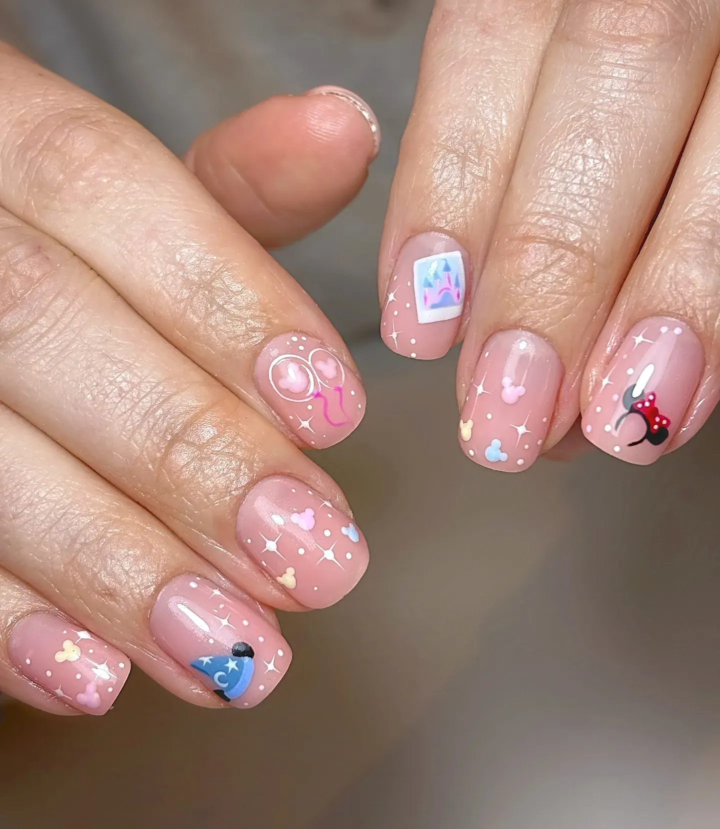 From the castle and Mickey balloons to Minnie ears, these nails capture everything we love about Disney World in one perfect mani.